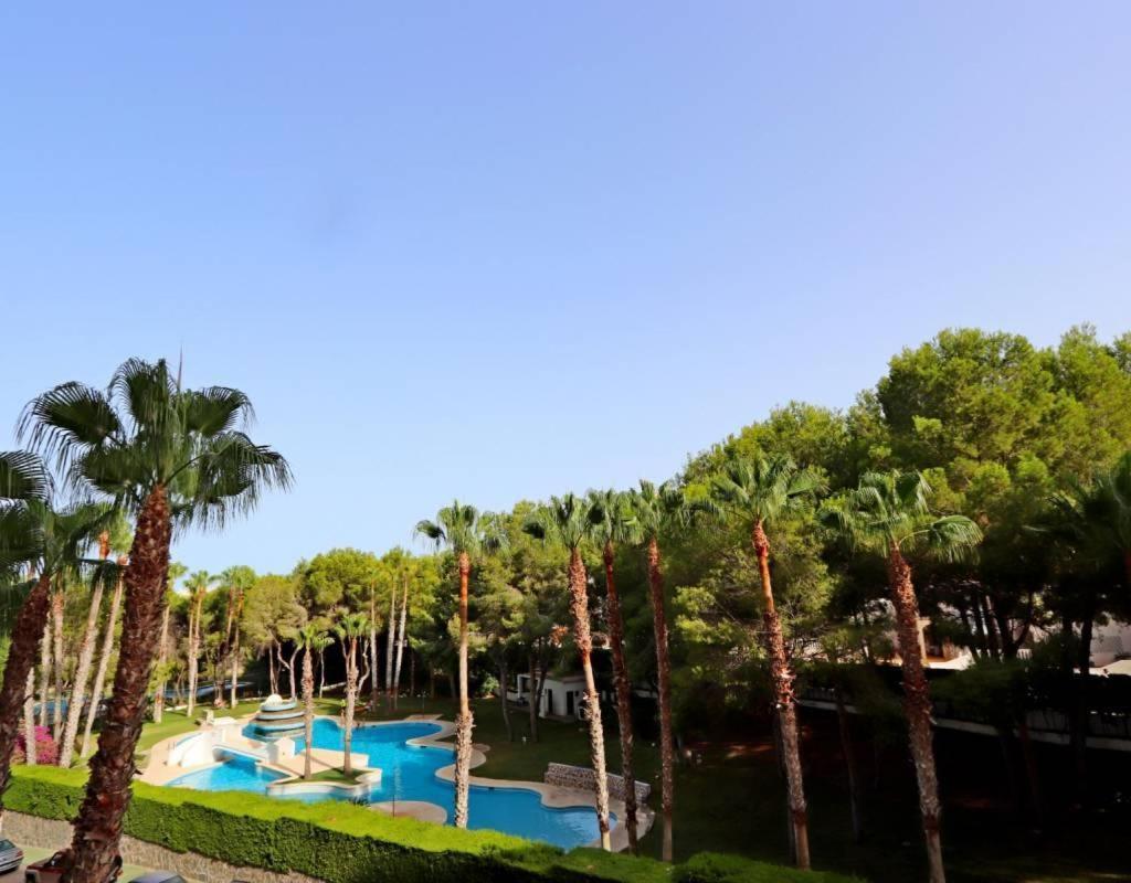Apartment In Campoamor Overlooking The Swimming Pool Kültér fotó